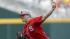 North Carolina State starting pitcher Carlos Rodon throws against North Carolina in the first inning of an NCAA College World Series game in Omaha, Neb., Sunday, June 16, 2013. (AP Photo/Nati Harnik)