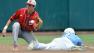 North Carolinas Chaz Frank (2) steals second base ahead of the throw to North Carolina State shortstop Trea Turner, left, in the first inning of an NCAA College World Series baseball game in Omaha, Neb., Sunday, June 16, 2013. (AP Photo/Ted Kirk)