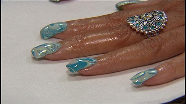 Can't pick just one color for your manicure? Nail marbling lets you swirl