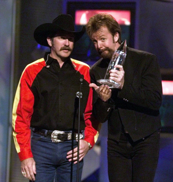 Photos: Eye-catching fashion from the CMA Awards through the years ...