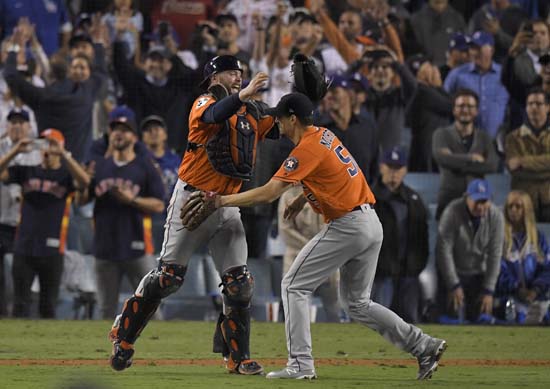 <div class='meta'><div class='origin-logo' data-origin='AP'></div><span class='caption-text' data-credit='AP'>Houston Astros catcher Brian McCann and starting pitcher Charlie Morton celebrate after win against the Los Angeles Dodgers in Game 7. (AP Photo/Mark J. Terrill)</span></div>