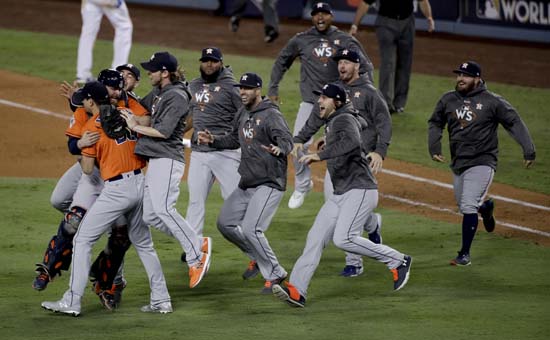 <div class='meta'><div class='origin-logo' data-origin='AP'></div><span class='caption-text' data-credit='AP'>Members the the Houston Astros celebrate their win against the Los Angeles Dodgers in Game 7 of baseball's World Series. (AP Photo/Jae C. Hong)</span></div>