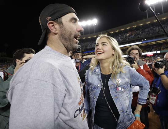 <div class='meta'><div class='origin-logo' data-origin='AP'></div><span class='caption-text' data-credit='AP'>Houston Astros' Justin Verlander celebrates with Kate Upton after Game 7 of baseball's World Series against the Los Angeles Dodgers. (AP Photo/Matt Slocum)</span></div>