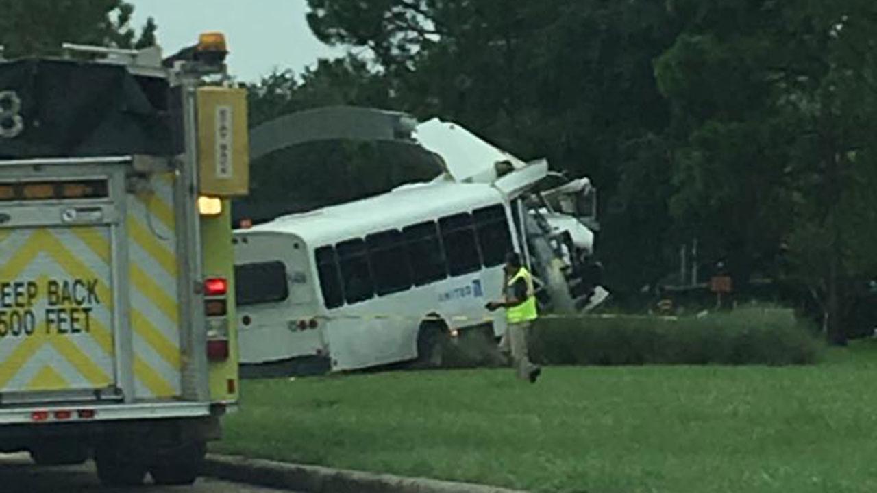 Bus crashes into welcome sign at Bush airport | abc13.com