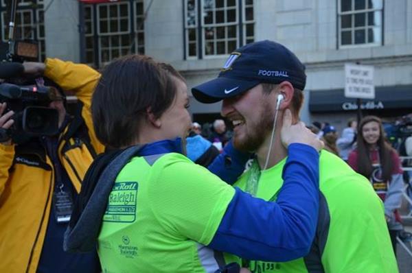 <div class='meta'><div class='origin-logo' data-origin='none'></div><span class='caption-text' data-credit=''>Carrie and Brent after he finished the race</span></div>