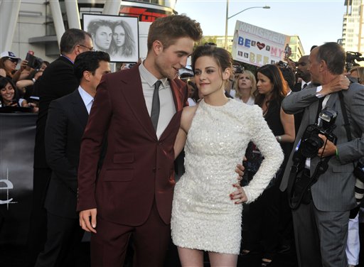 Robert Pattinson, left, and Kristen Stewart arrive at the premiere of 'The Twilight Saga: Eclipse' on Thursday, June 24, 2010 in Los Angeles.